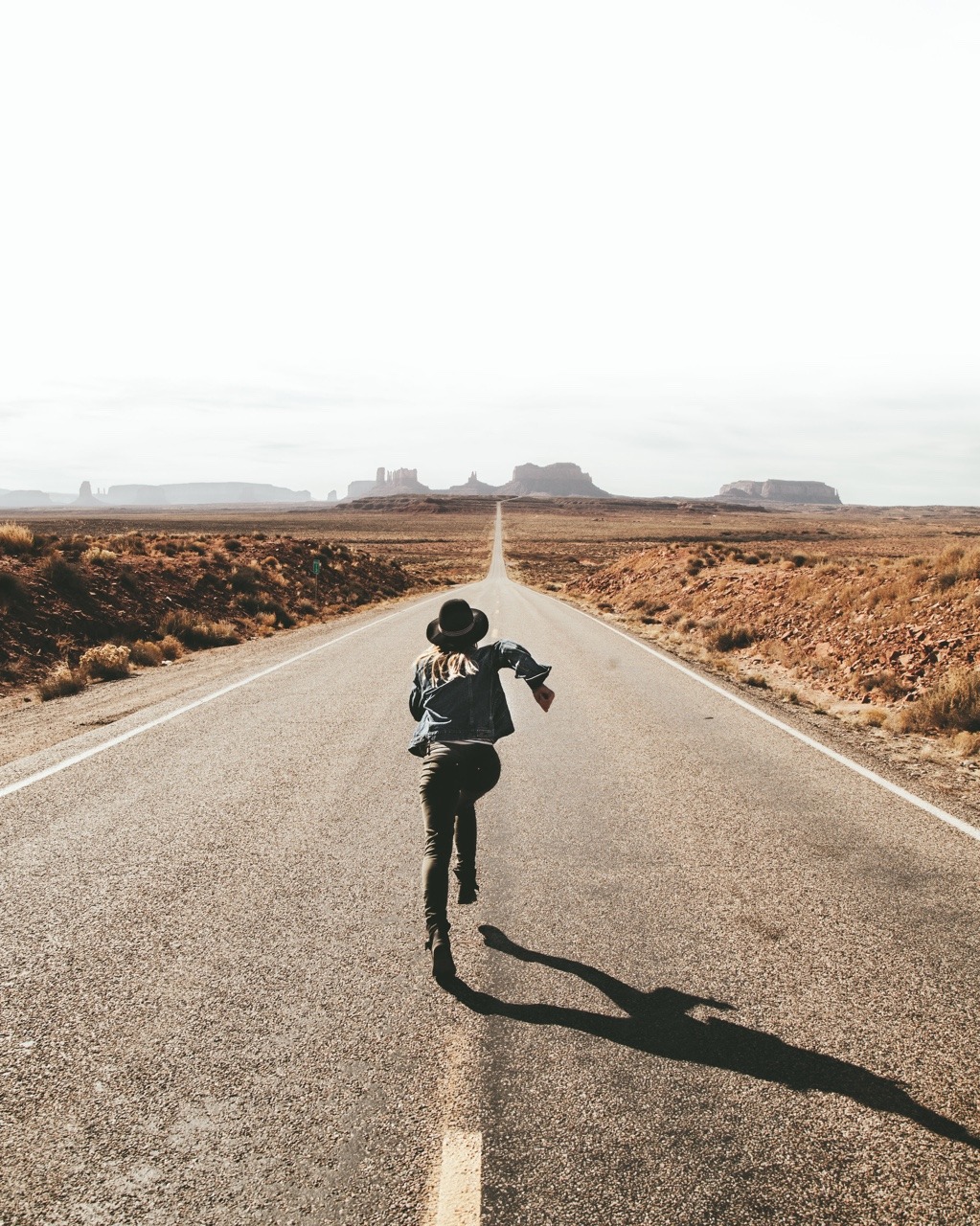 Woman running on road